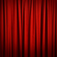 a close up of a red curtain