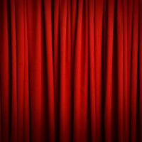a close up of a red curtain